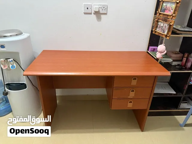 good condition study table with rotating arm chair