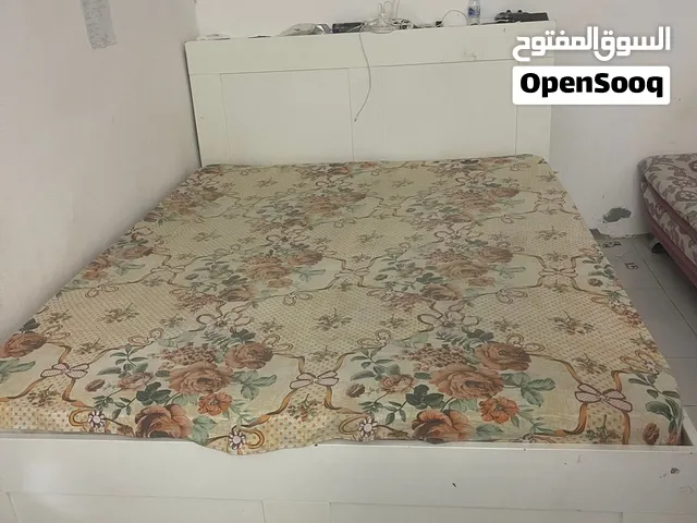 The bed headboard and mattress is for sale