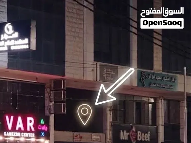 فرصة استثمارية: مخزن للايجار مساحته 100م ارضي مع سده 100 متر قرب دوار اليوسفي شارع اربد-الحصن