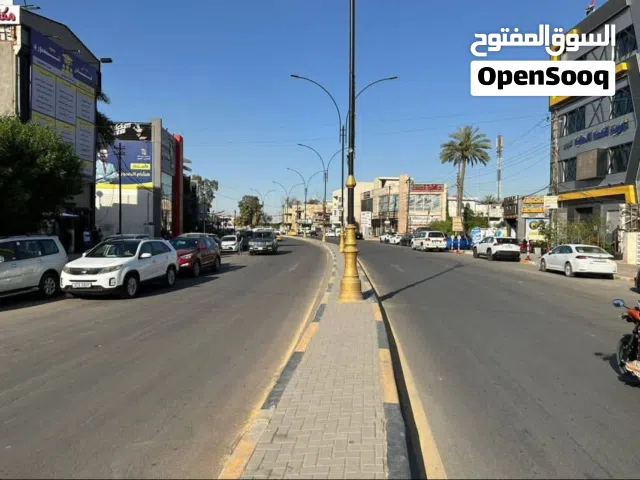 بيت للبيع تجاري حي تونس ركن على شارع 600 مباشر