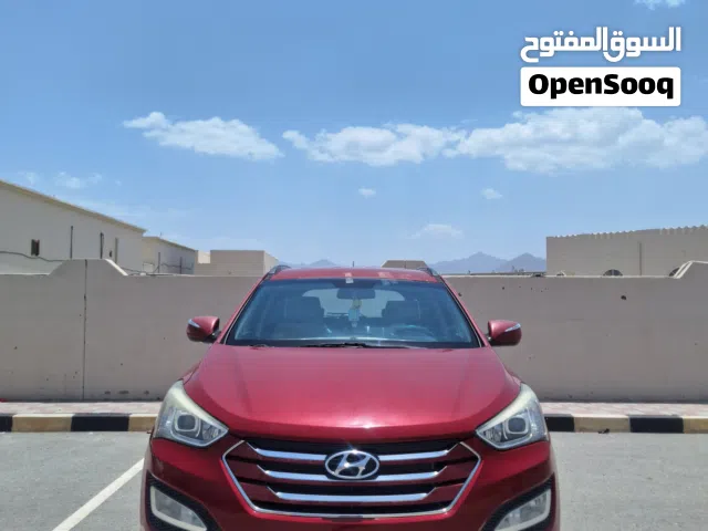 سيارة سنتافي 2014 هيونداي احمر مرخصة ومجهزة بنظام أوتوماتيك وجاهزة للبيع