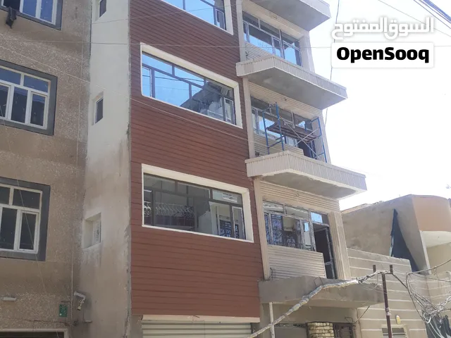 بناية تجارية للبيع في الكرادة داخل مقابل مستشفى الراهبات