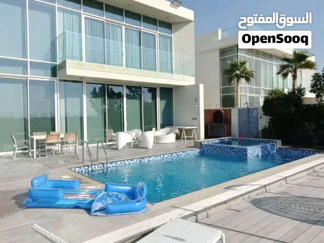 Luxury Villa in a Prestigious Gated Community with Direct Golf Course Views in Al Zorah, Ajman