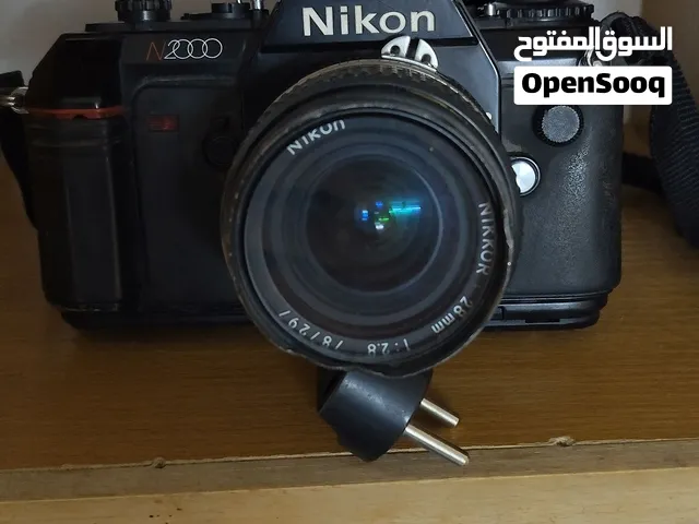 كاميرا نيكون اصليه يابانيه المعروف لا يعرف الكاميرا معطله بحاجه الى صيانه للبيع السعر 40دينار منهي.