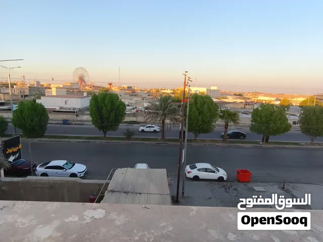 ايجار بيت تجاري على الشارع العام مباشرة مقابل حدائق الاندلس ومديرية تربية البصرة المعقل