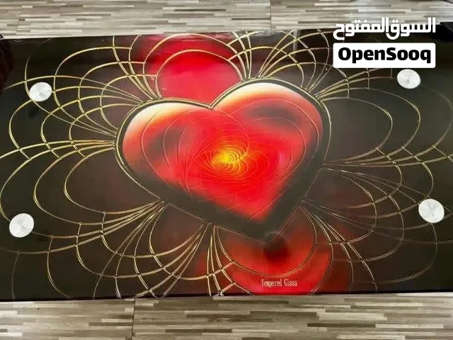طاوله زجاج سميك طابقين طولها متر و10 سنتي وعرضها 60