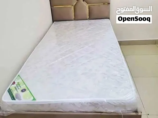 selling brand new single bed with mattress with home delivery