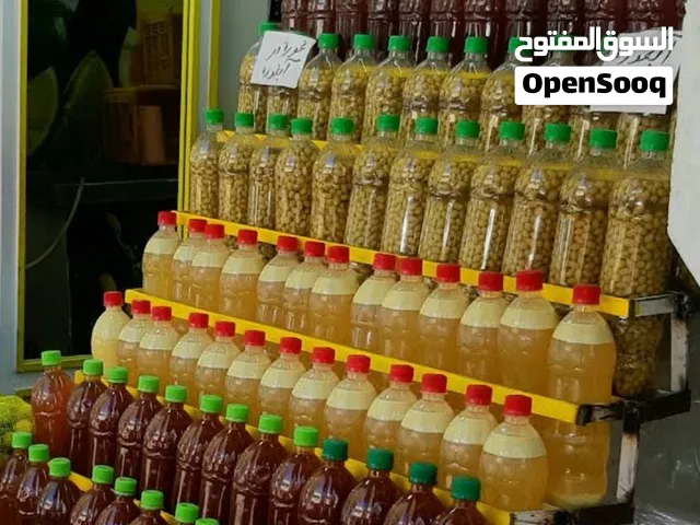 الإيراني عصير الليمون والخلّ التفاح ودبس العنب وعصير العنب الحامض العضوي
