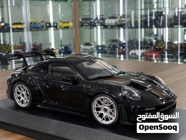 Model Minichamps Porsche 911 (992) GT3 RS (2023) - Black with silver wheels