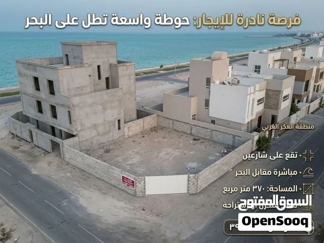 أرض مسورة بإطلالة مباشرة على البحر