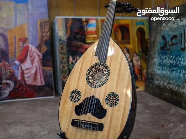 عود أحمد عبد الحليم أكولايزر  6 اوتار صوت ممتاز مع شنتة اصلية وريشة متوفر توصيل صناعة مصرية