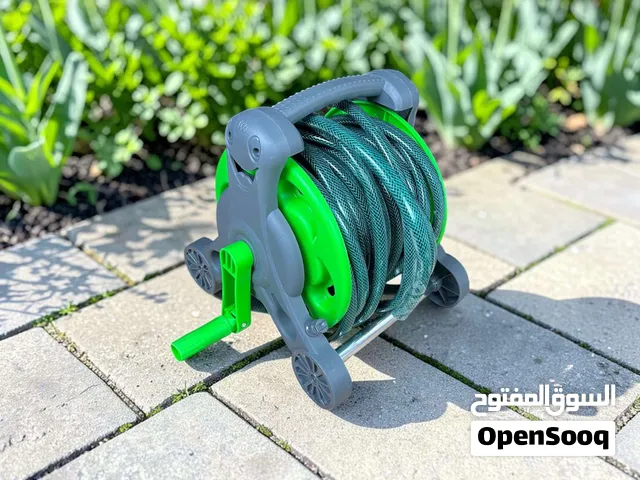 خرطوم مياه مع بكرة