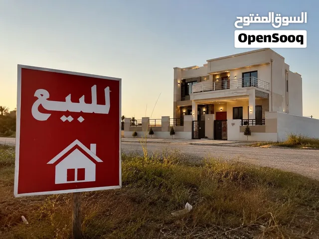 قطعة ارض للبيع 200م _ الكوت الجديدة _ شارع الأقواس بموقع مميز وخدمات متوفرة