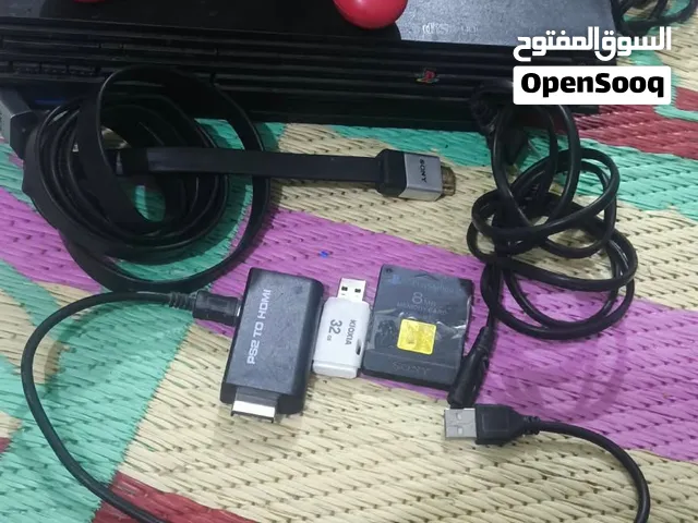 بليستيشن 2 ps  كامل ملحقات مهكر بيه فلاش 32 كيكا  وفيشه hd وميموري وياه وخزنه 8 العاب وثلاث جوستكات