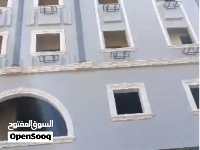 محل تجاري بالدور الارضي ببرج الأطباء بأسيوط مساحة 13م بشارع26 يوليو المتفرع من شارع يسري راغب