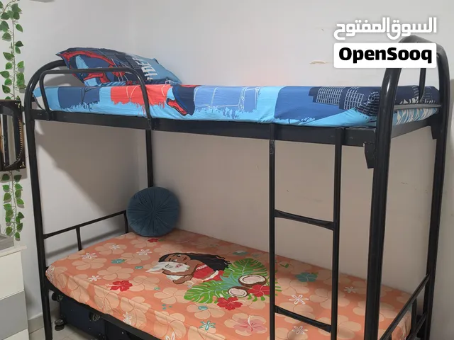 Metal Bunk Bed with 2 Mattresses in good condition.  سرير معدني بطابقين مع مرتبتين بحالة جيدة.