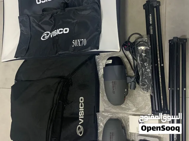 Studio lighting kit includes soft light boxes, stands, lamps, carrying case + one tripod camera