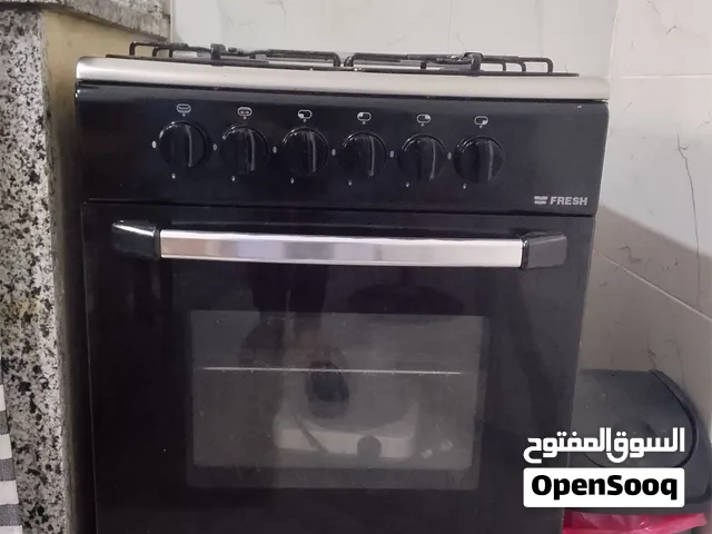 فرن غاز اربع كوانين و كوشة طابقين