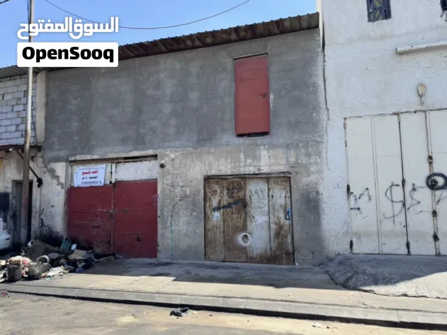 مخزن ويحتوي على محل صغير المساحة 140 متر طابقين طابو صرف بأسمي