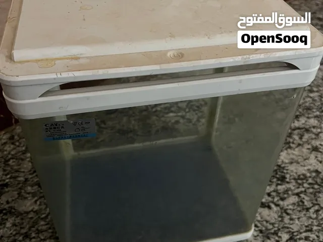 حوض سمك زجاج مستعمل مع اضاءه وغطاء