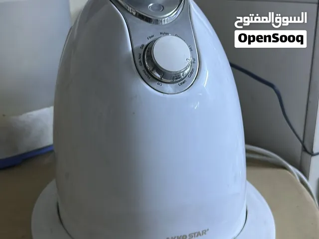 اوتي ، مكواة بخاري عمودي