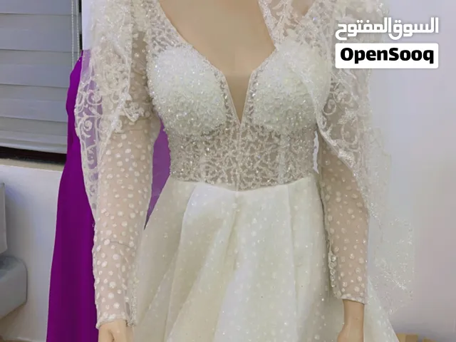 فساتين زفاف جديد وملبوس