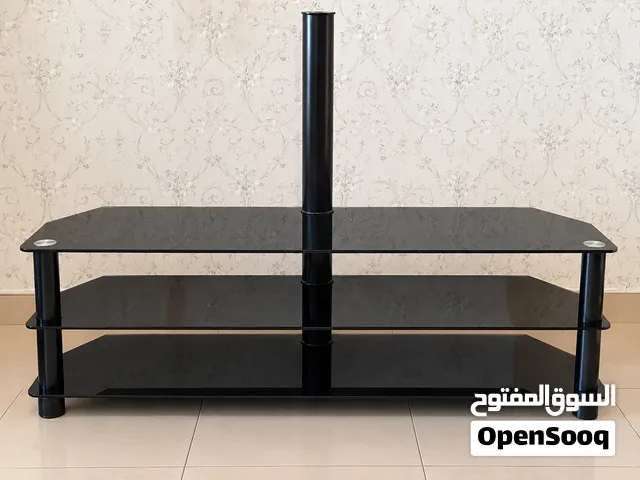 طاولة تلفزيون زجاج أسود – 100 درهم