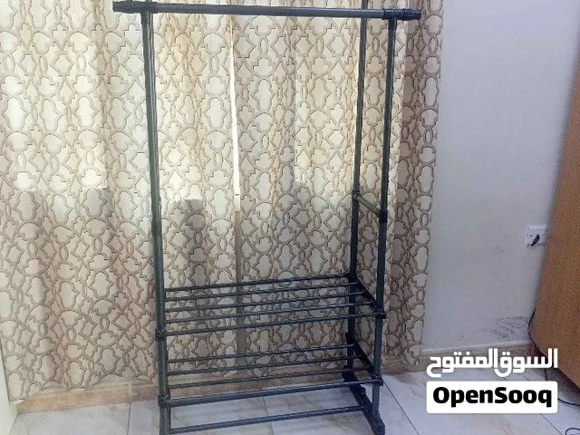 Clothes hanging metal stand