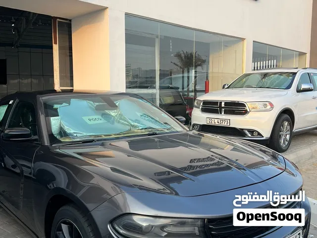 دوجً جارجر موديل 2021 مواصفات أمريكي مكفوله كفاله عامه والباقي شوف العين سعر مناسب