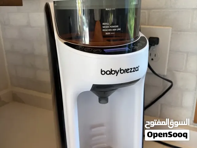 صانعة الحليب و معقم المراضع من شركة Baby brezza