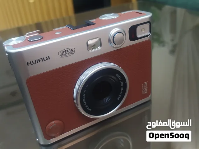 كاميرا Fujifilm Instax Mini Evo Hybrid – بني (جديدة تماماً) للبيع!