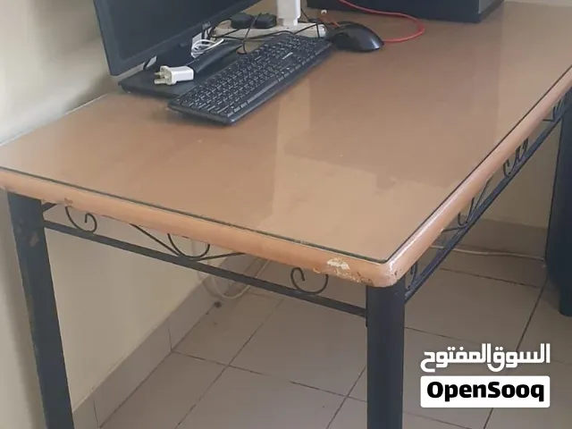 Glass Covered Metallic Wooden Table used for office works
