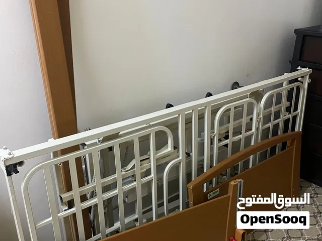 سرير طبي كهربائي