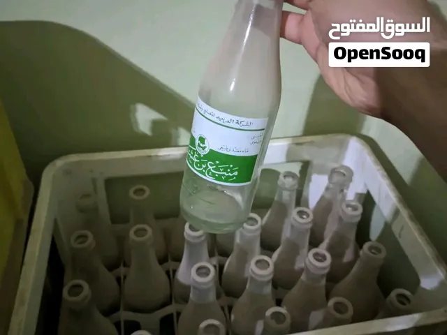 مجموعة زجاجات مشروب