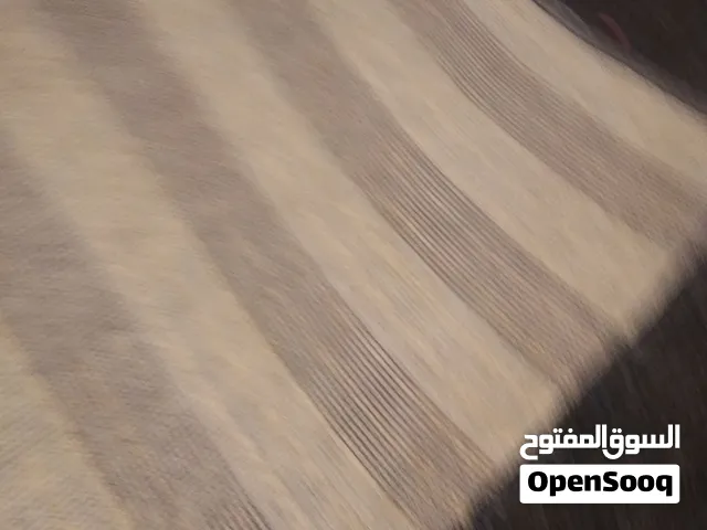 بساطات يفرش أربعة غرف وممر