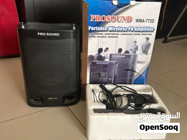 Speaker with wireless microphones