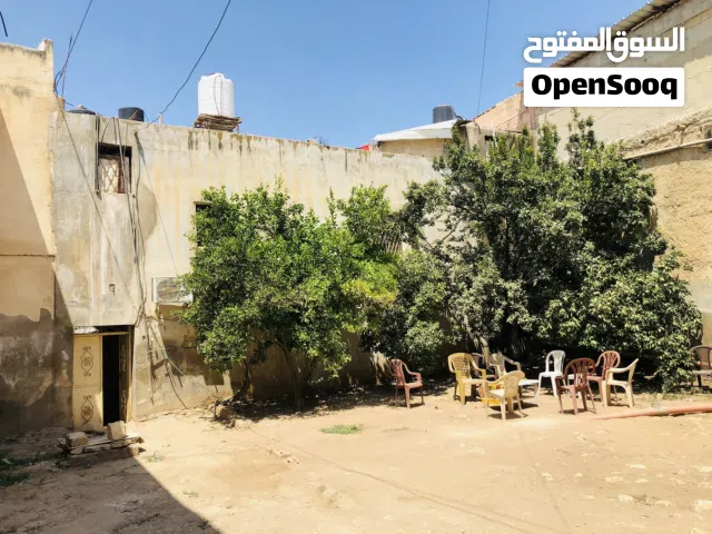 بيع محلات ومنزل