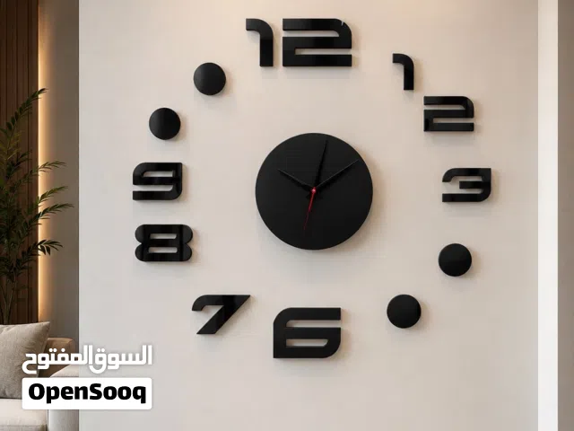 ساعة حائط مودرن سوداء – تصميم ديكوري فاخر للمنازل