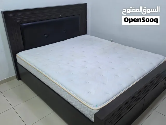 Dark wood double bed set from Pan Emirates. excellent condition