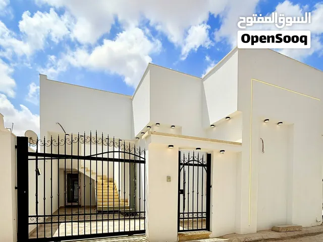 منازل أرضية للبيع عين زارة بالقرب جامع عثمان بن عفان الحاراتي