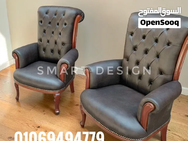 كراسي مكتبيه خشب زان مبطن جلد كابوتونيه متاح جميع الالوان