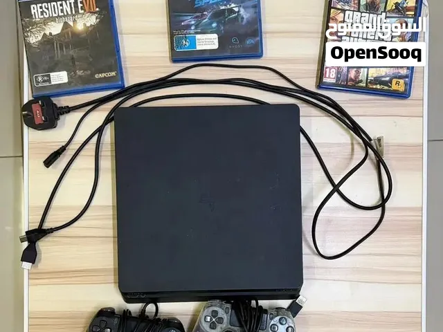 PS4 Slim 1TB + 2 Original Controllers + 3 Games  PS4 Slim 1TB + يدين أصليتين + 3 ألعاب