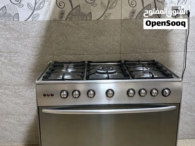 طباخ مع ساحبة