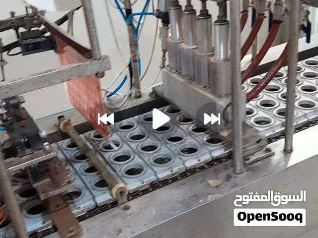 ماكينة تعبئة وتغليف كاسات 4 عيون شغالة 100 بالمية