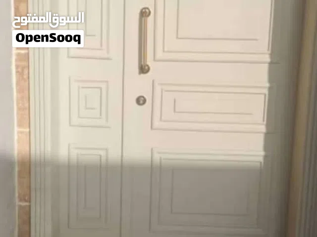 ورشة نجارة أو زواقّ وصيانه أبواب