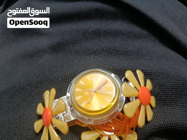 ساعه سواتش برتقاليه جيده جدا