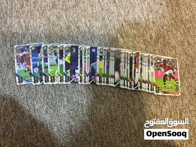 Bunch of playing cards with footballers pics on it