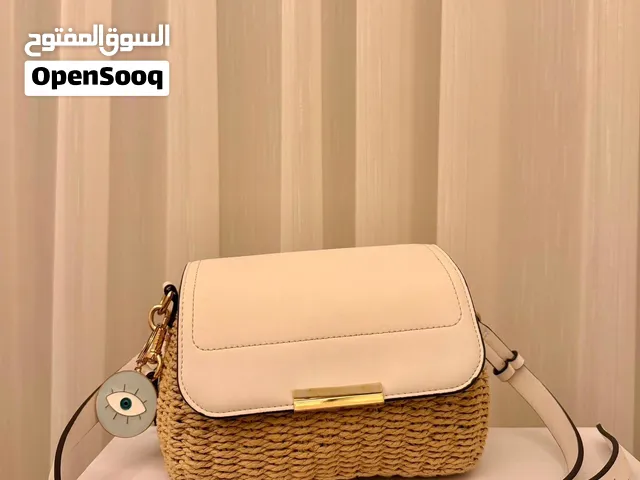 شنطة يد قش