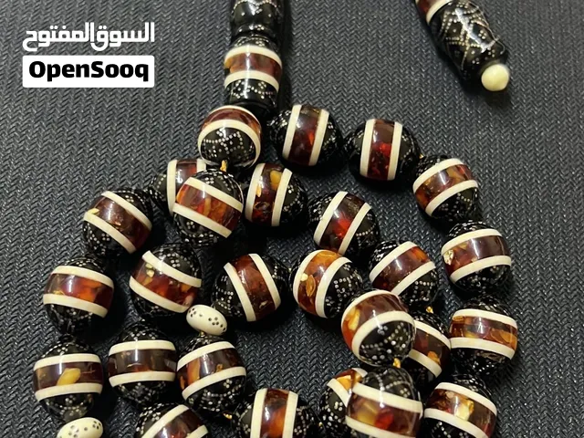 سبحة يسر مطرز فضه مطعم بعاج وكسر كهرمان