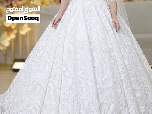 فستان زفاف تفصيل